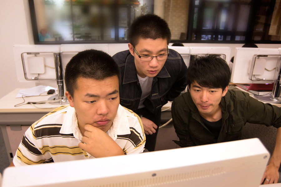 Undergraduate students work together on a computer lab assignment at New York Tech’s Old Westbury campus on Long Island, New York, on March 21, 2016. The university is known for its emphasis on technology-focused education, engineering, and hands-on academic collaboration.
