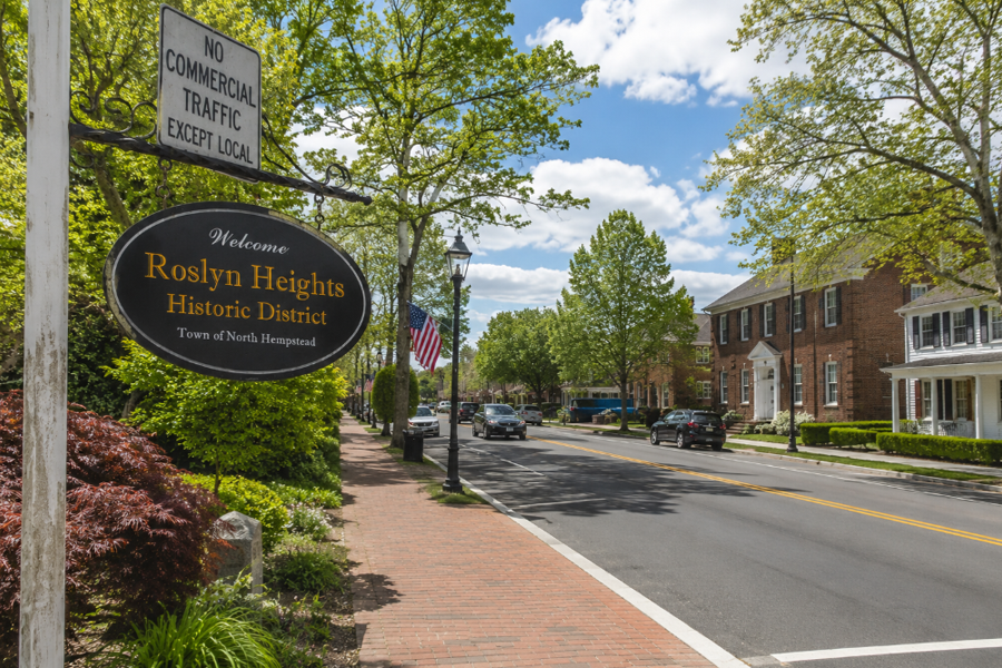 Welcome sign marking the Roslyn Heights Historic District in the Town of North Hempstead. The historic neighborhood is known for its tree-lined streets, established homes, and close proximity to the North Shore communities of Nassau County, offering residents a blend of suburban character, local history, and convenient access to Long Island transportation corridors.
