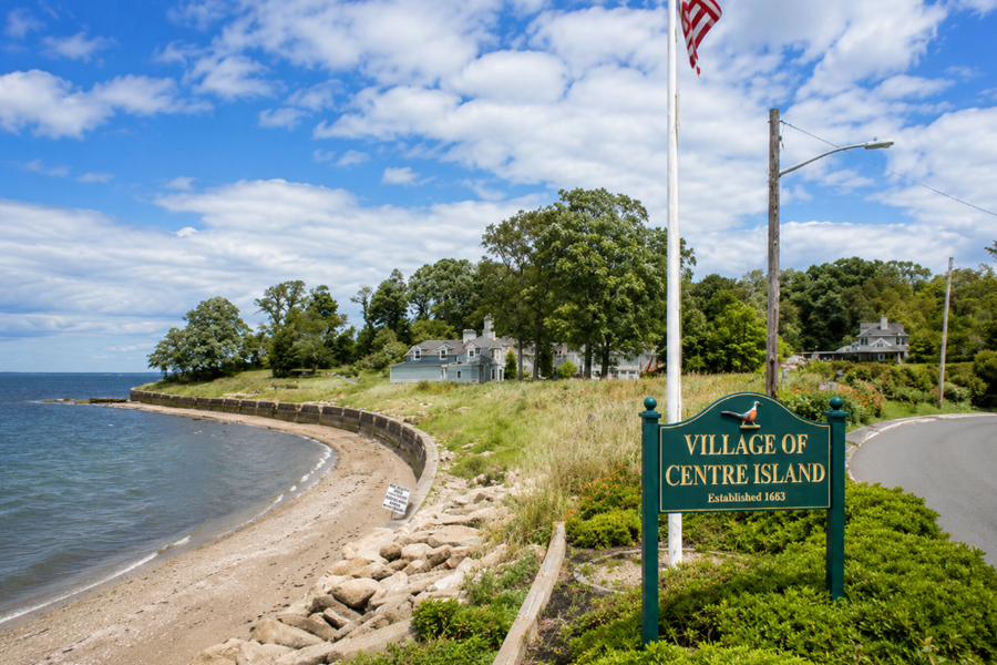 The entrance to Centre Island on Long Island's North Shore. Surrounded by Oyster Bay Harbor and Long Island Sound, the village is known for its waterfront estates, scenic shoreline, wooded landscapes, and quiet residential character. Centre Island remains one of Nassau County's smallest and most exclusive incorporated villages.