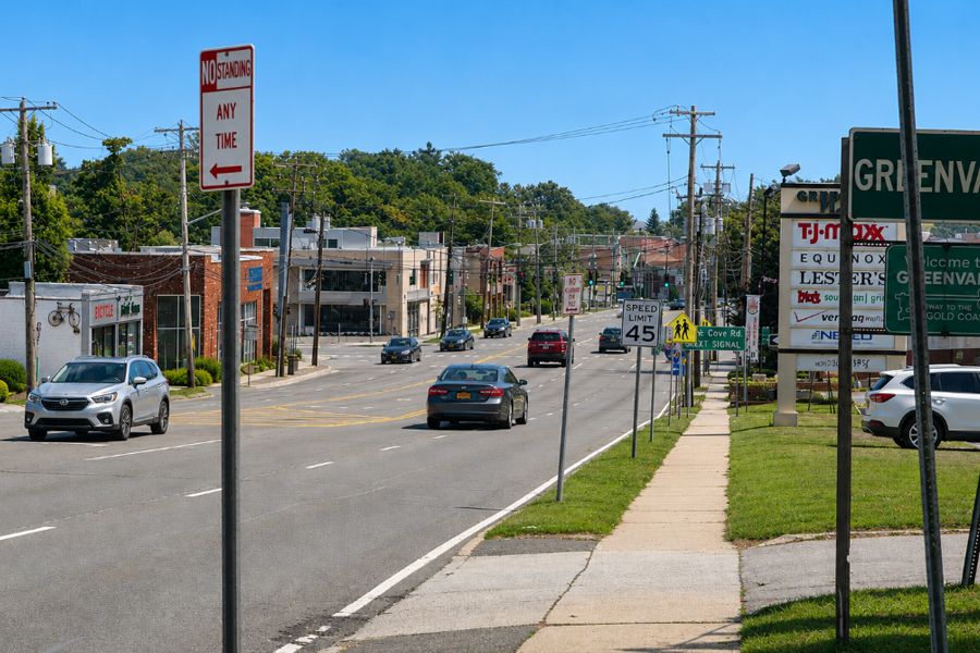 A sunny view along Northern Boulevard in Greenvale, New York, showcasing the hamlet’s commercial corridor, local businesses, and North Shore character. Located in Nassau County between Roslyn and Glen Cove, Greenvale serves as a regional center for shopping, education, and transportation, anchored by nearby LIU Post and the Greenvale Long Island Rail Road station.