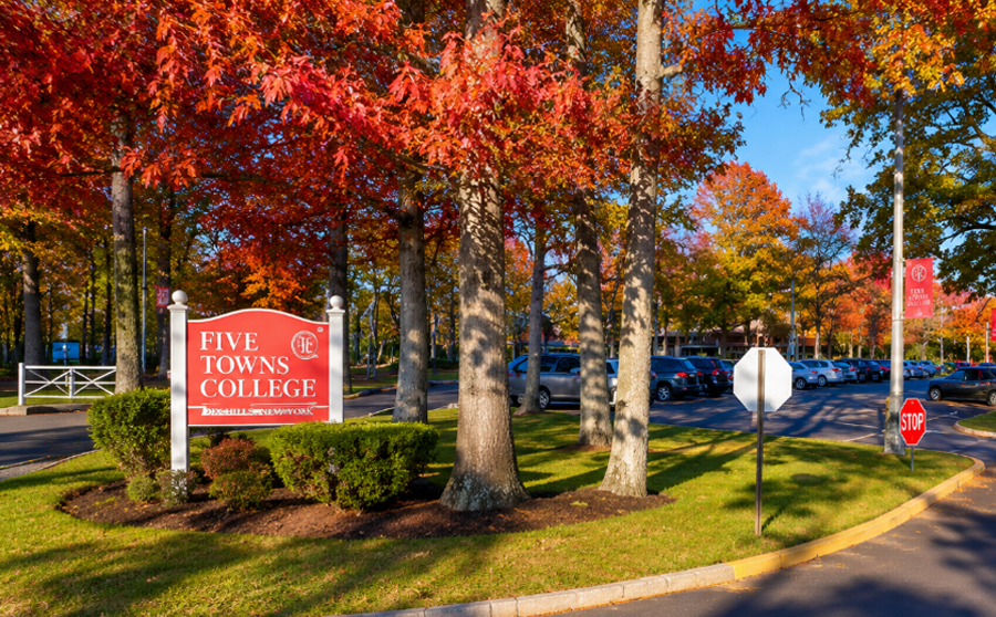The entrance to Five Towns College in Dix Hills, Suffolk County. The private college has been part of Long Island's higher education landscape since 1972 and is recognized for programs in music, media, broadcasting, education, business, and the performing arts. File photo: AI-generated illustration based on the campus entrance.