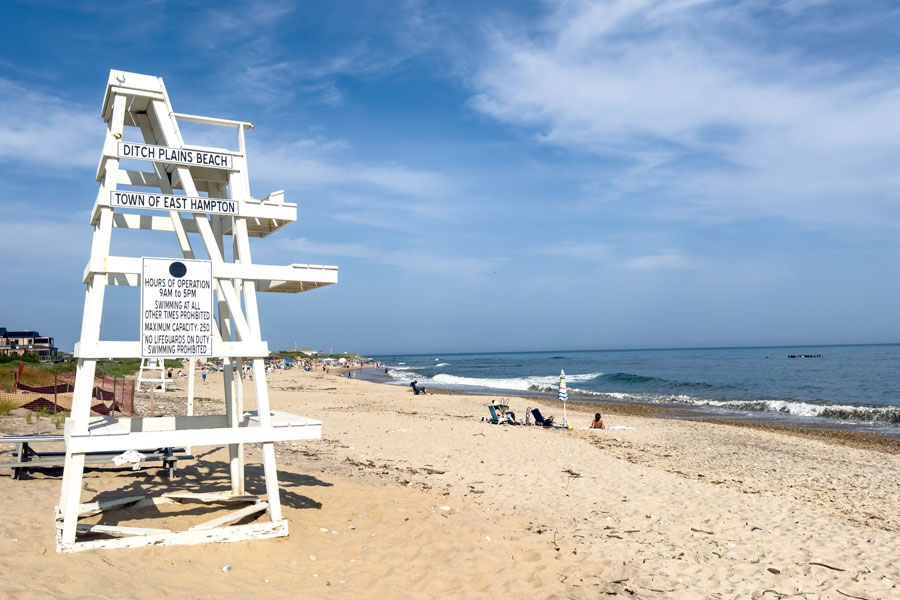 Ditch Plains Beach in Montauk is one of Long Island’s most famous surfing destinations, drawing surfers, beachgoers, and outdoor enthusiasts from across the Northeast. Located along the Atlantic Ocean on the eastern end of the South Fork, the beach is known for its consistent waves, wide shoreline, and laid-back coastal atmosphere. The iconic lifeguard stand overlooking the ocean has become a familiar symbol of Montauk’s surf culture and its reputation as one of the Hamptons’ premier oceanfront destinations.