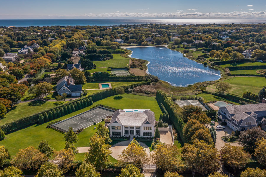 An aerial view of a luxury estate in the Hamptons showcases the upscale residential character for which the South Fork is known around the world. Expansive homes, private tennis courts, manicured grounds, and scenic ponds are common features throughout communities such as Southampton, East Hampton, and Sagaponack, where coastal beauty and exclusivity often go hand in hand. While the Hamptons are famous for their high-end real estate and seasonal residents, the region also preserves open space, farmland, beaches, and historic villages that contribute to its distinctive character.