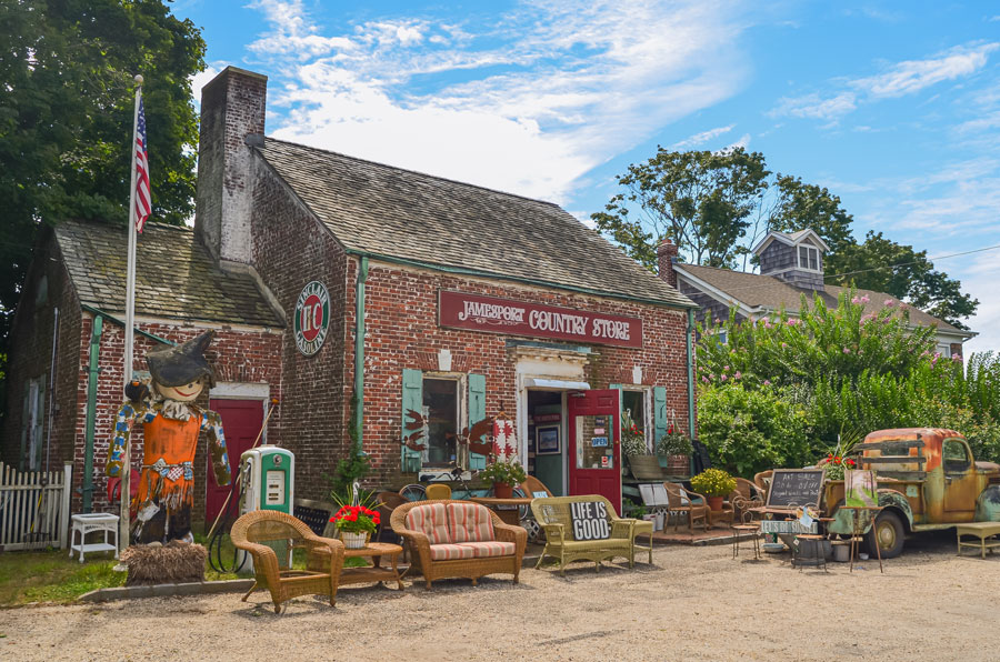 The Jamesport Country Store reflects the rural character and small-town charm that have long defined the North Fork of Long Island. Surrounded by antique furnishings, vintage Americana, and historic farm-country décor, the store serves as both a local gathering place and a reminder of the region’s agricultural heritage. Located in the hamlet of Jamesport, the landmark shop embodies the slower pace, historic character, and nostalgic atmosphere that continue to attract visitors exploring the North Fork’s villages and back roads.