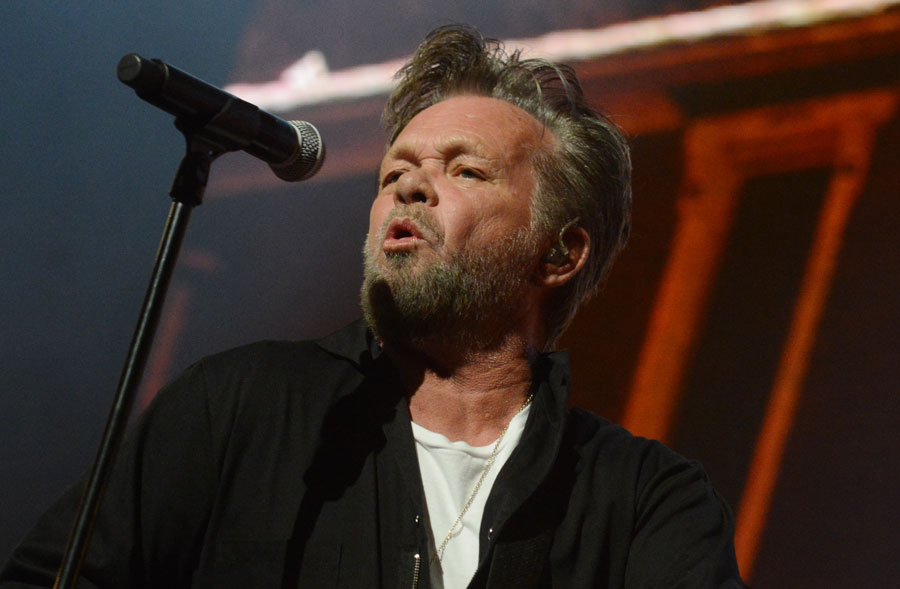 John Mellencamp performs during the 2018 Farm Aid benefit concert in Hartford, Connecticut. The Rock and Roll Hall of Fame singer-songwriter has been a longtime advocate for American family farmers and remains one of the most recognizable voices in heartland rock. Mellencamp is scheduled to bring his unique Dancing Words Tour to Northwell at Jones Beach Theater on July 26, 2026.