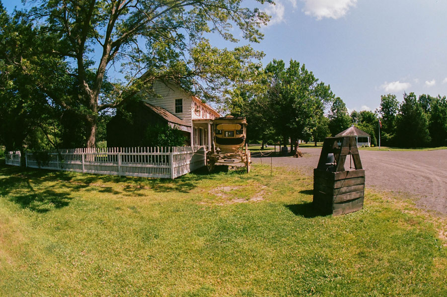 Historic buildings and period features at Old Bethpage Village Restoration preserve the appearance of a 19th-century Long Island farming community. The living history museum allows visitors to experience authentic homes, shops, and rural landscapes that reflect everyday life during the 1800s.