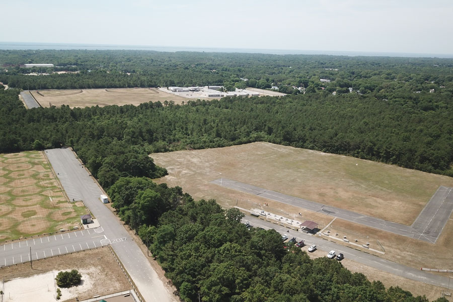Aerial view of the Upton area in central Suffolk County, showing the wooded landscape that surrounds Brookhaven National Laboratory and the heart of Long Island's Pine Barrens region. Upton is best known as a center for scientific research, environmental preservation, and the home of one of the nation's premier national laboratories.