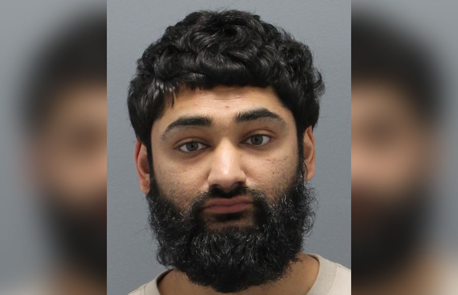 Balraj Singh, 28, of Richmond Hill, Queens, was arrested and charged with kidnapping, unlawful imprisonment, and multiple domestic violence-related offenses after police said he held a 19-year-old woman against her will at a Huntington motel. Courtesy of the Nassau County Police Department.