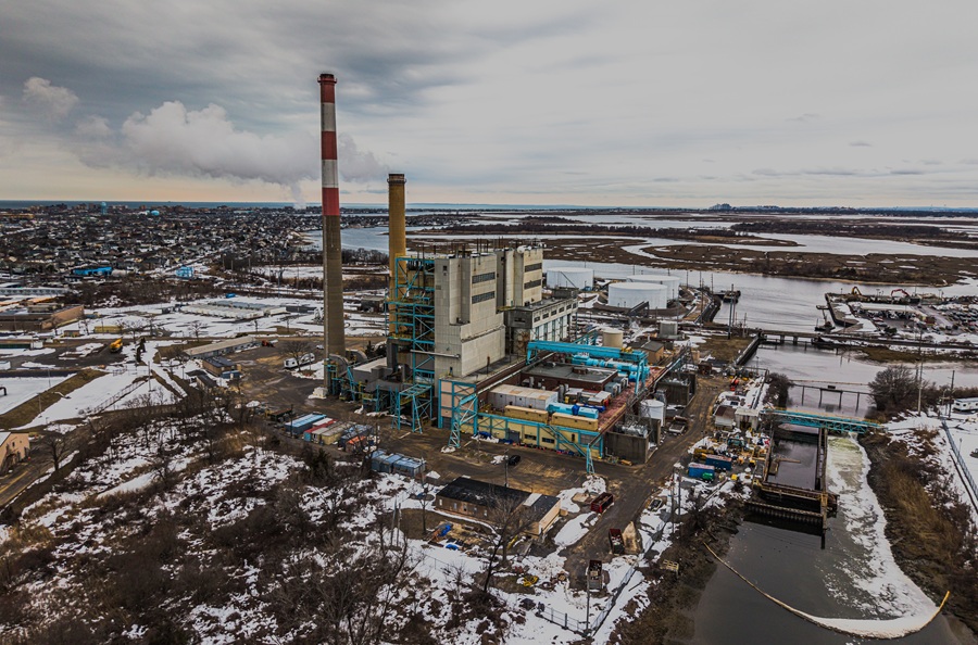 An aerial view of the E. F. Barrett Power Station (Island Park Energy Center) in Barnum Island shows one of Long Island's major electric generating facilities alongside the marshes and waterways of Reynolds Channel. The plant has long been a prominent landmark on Nassau County's South Shore and serves communities throughout the region. File photo: Audley C Bullock, licensed.
