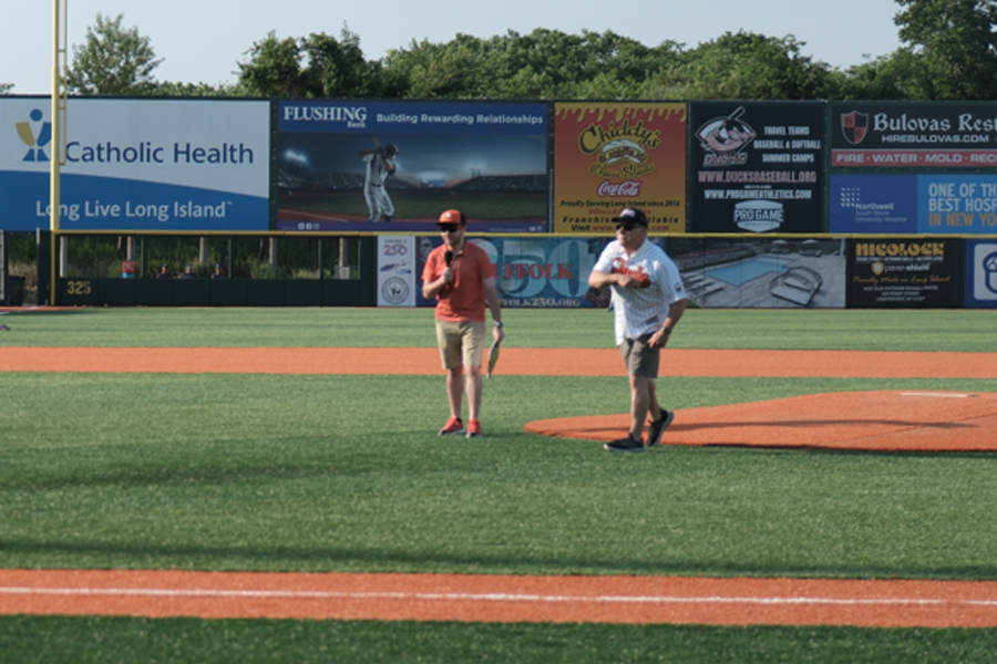 Suffolk County District Administrative Judge Hon. Andrew Crecca throws out the ceremonial “first pitch” of the ballgame.