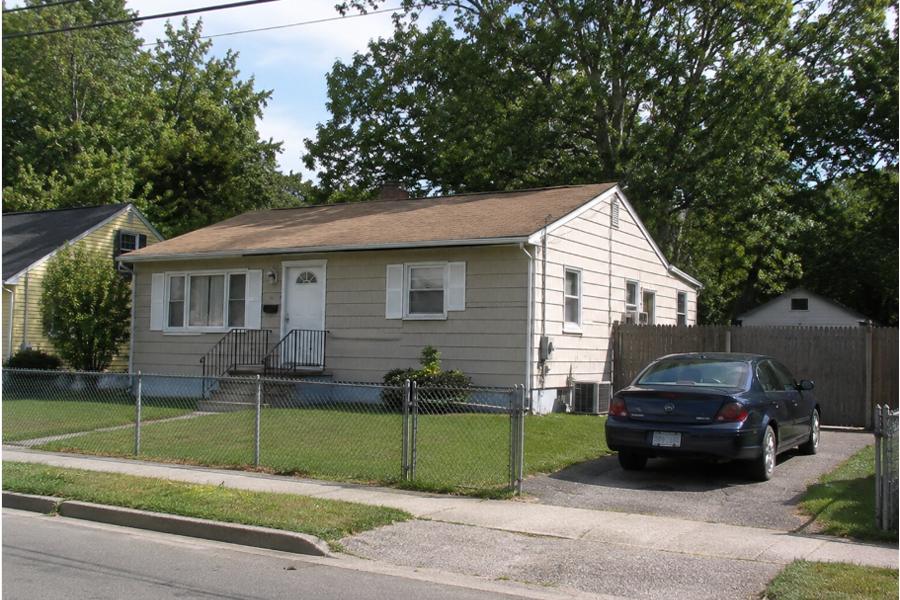 Modest single-family homes and quiet residential streets reflect the everyday character of Gordon Heights, a historic Brookhaven hamlet where generations of families have built a close-knit community. The neighborhood's ranch-style houses, mature trees, and suburban setting represent the community's steady growth since its founding in 1927.