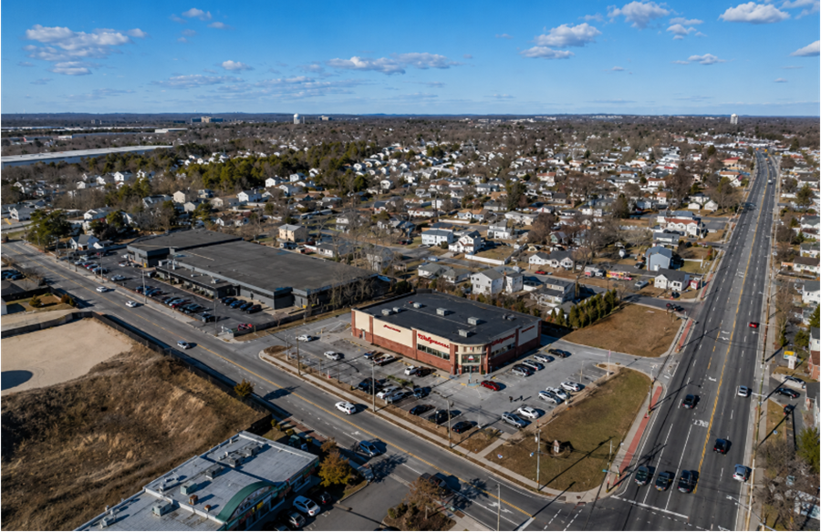 An aerial view of North Bay Shore, New York, showcases established residential neighborhoods alongside local businesses and major roadways. Its central location offers convenient access to Bay Shore, shopping, transportation, and the South Shore communities of Suffolk County on Long Island.