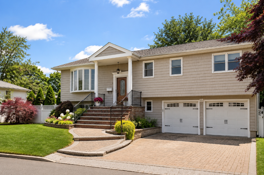 A typical split-level suburban home representing the residential character of North Woodmere, New York. The community is known for detached homes, landscaped properties, quiet streets, and convenient access to parks, waterways, and surrounding communities.