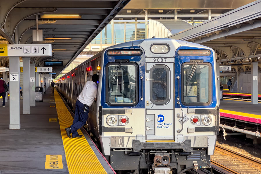 A Long Island Rail Road (LIRR) train waits at the platform before departing, illustrating the commuter rail system that connects dozens of Long Island communities with New York City. The LIRR provides one of the fastest and most convenient ways to travel across the island for commuters, residents, and visitors alike. File photo: Scott Heaney, licensed.