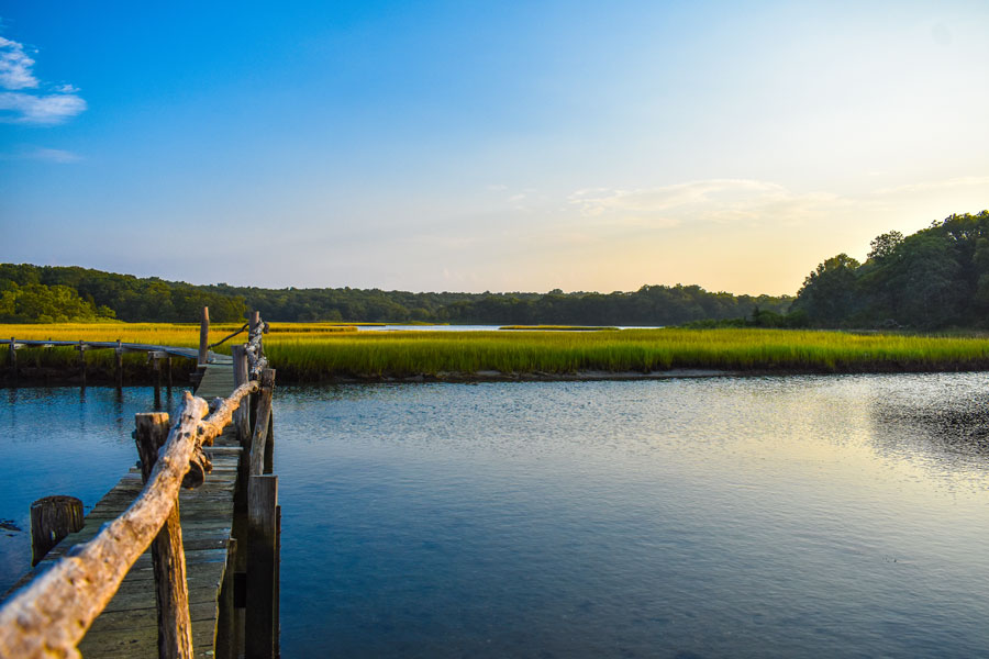 A peaceful view of Mashomack Preserve on Shelter Island shows tidal marshes, calm waterways, and one of Long Island's most ecologically significant protected landscapes. The 2,350-acre preserve is managed by The Nature Conservancy and provides important habitat for migratory birds, wildlife, and native coastal ecosystems. File photo: Paul G Gallery, licensed.