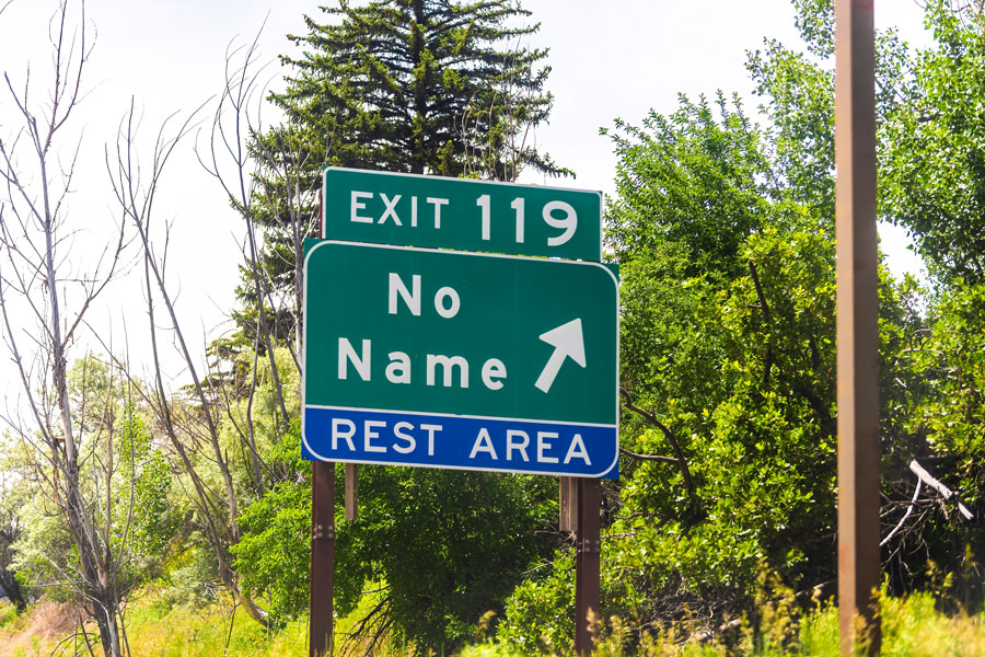 The entrance sign for No Name, Colorado, one of the nation's most famously named Census-Designated Places (CDPs). Despite its unusual name, No Name is an officially recognized community for U.S. Census statistical purposes, illustrating that a CDP is a geographic designation rather than an incorporated municipality.