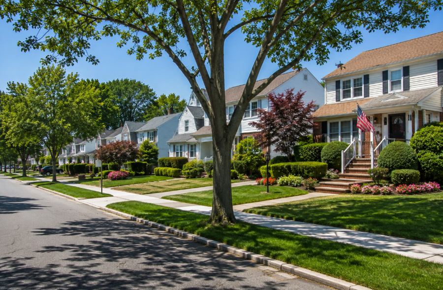 A quiet residential street in South Valley Stream, New York, features well-maintained homes, mature shade trees, and neatly landscaped front yards that reflect the community's established suburban character. Located along Nassau County's western border, South Valley Stream offers residents a peaceful neighborhood setting with convenient access to parks, shopping, major transportation routes, and an easy commute to New York City.