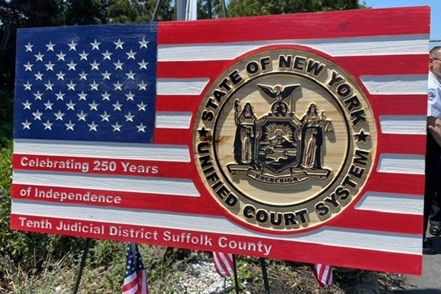 The Suffolk County Courts’ display board commemorating the 250th anniversary of American independence.
