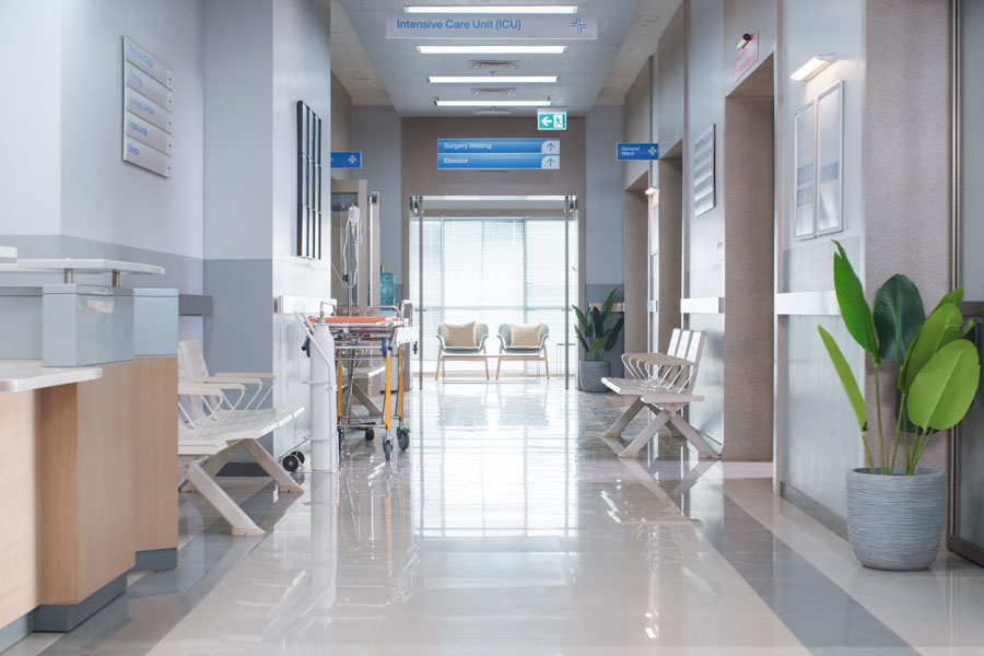 A bright, modern hospital corridor represents the clinical settings where Nassau Health Care Corporation provides medical, emergency, and specialized care to patients across Nassau County. File photo: licensed.