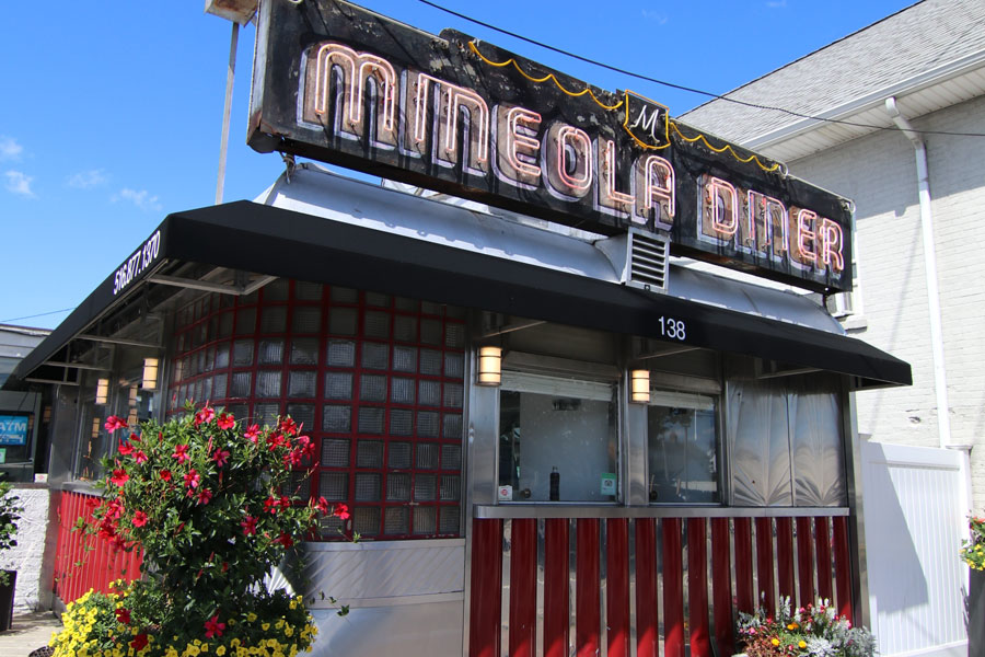 The historic Mineola Diner has served generations of diners in downtown Mineola, becoming one of Long Island's recognizable classic diner landmarks. Housed in a traditional stainless-steel diner building, it reflects the island's longstanding diner culture, where breakfast, lunch, dinner, and late-night meals have brought together local residents and visitors for decades.