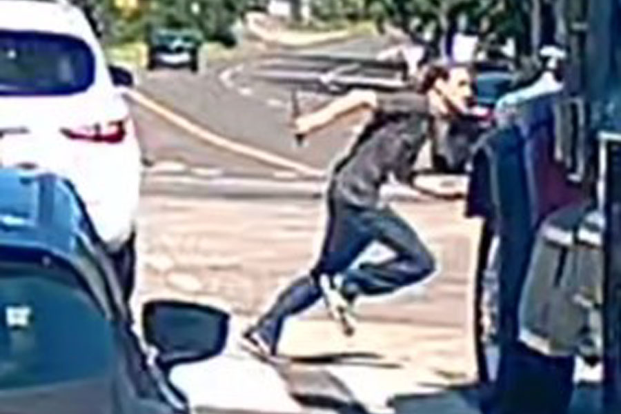 A still image from surveillance video showing the alleged chase involving Timothy Stark in Medford. The image was released by the Suffolk County Police Department.