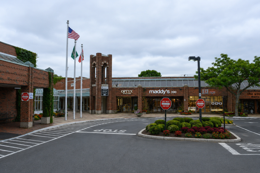 Wheatley Plaza in Greenvale, New York, is an upscale shopping and dining destination known for its distinctive brick architecture, landscaped courtyards, and collection of boutique retailers, restaurants, and specialty businesses serving Long Island's North Shore.