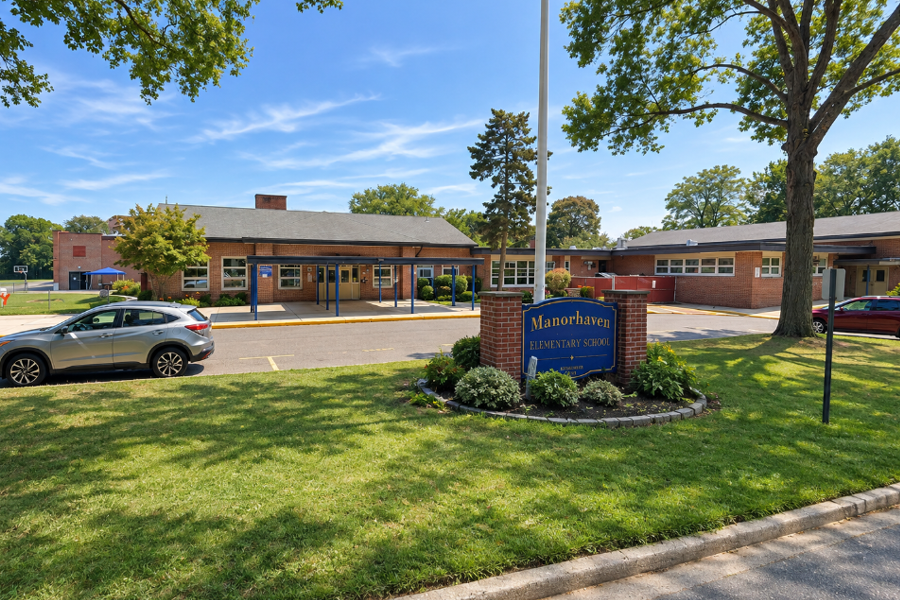 Manorhaven Elementary School along Sands Point Road, just north of Manorhaven Boulevard in Manorhaven, near the western border of Port Washington.