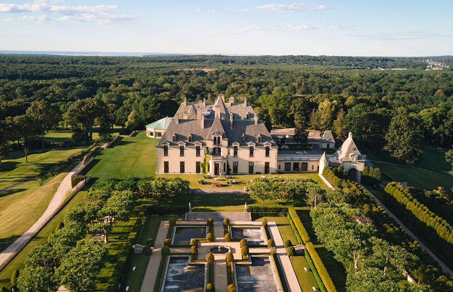 An aerial view of Oheka Castle and its formal gardens in Huntington, New York. The historic Gold Coast estate is scheduled to be offered at auction on October 27, 2026, as part of ongoing Chapter 11 bankruptcy proceedings.