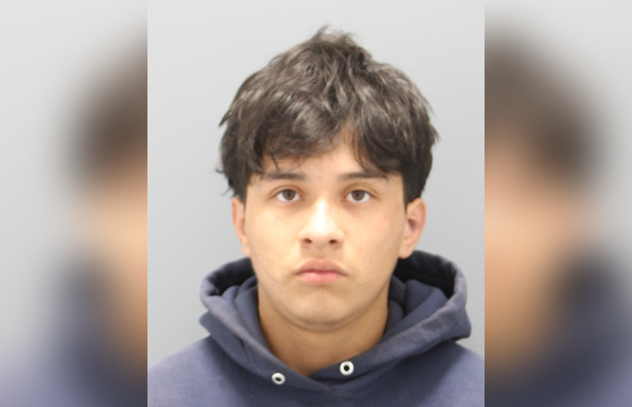 Ernest Naranjo, 22, of Westbury, is accused of biting a 21-year-old woman, forcing his way back into a New Cassel residence and attacking her with a firearm, according to Nassau County police. Officers said a loaded Colt .25-caliber handgun was recovered after Naranjo was apprehended following a brief foot pursuit. Photo: Nassau County Police Department.